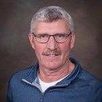1:1 Doug Ritchie Headshot 2024